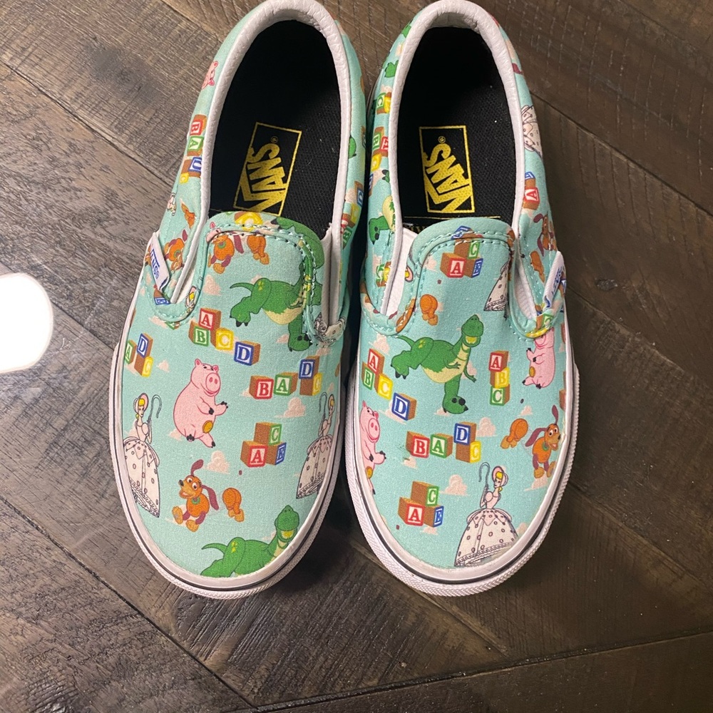Vans toy story slip ons